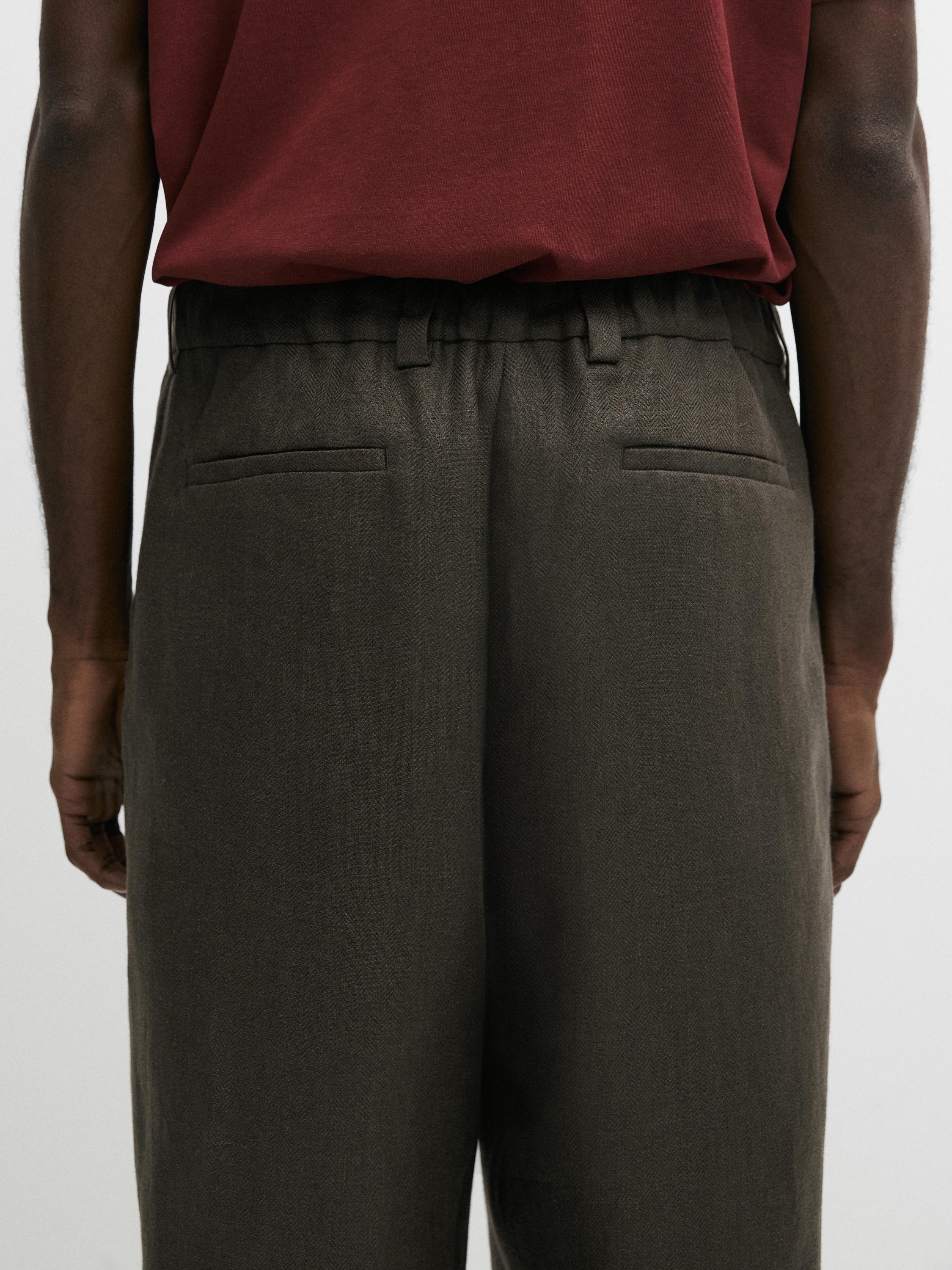 Linen trousers with herringbone detail